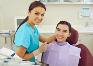 Dentist examining a patient during a dental appointment