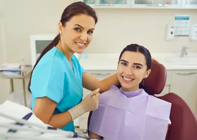 Dentist examining a patient during a dental appointment